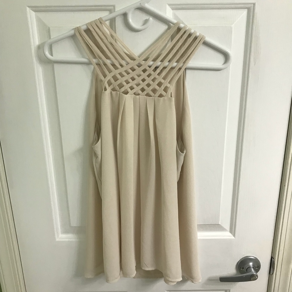 Cream color tank top size L brand is naked zebra